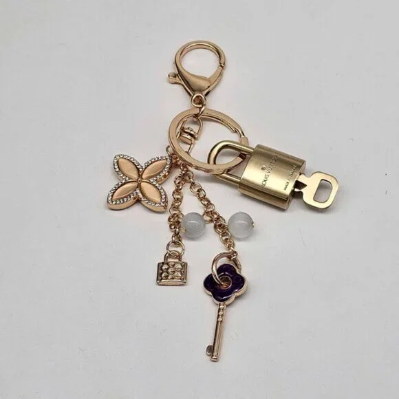 Authentic Louis Vuitton Lock & Key with unbranded Clover Flower Bag Charm 100525 - Picture 5 of 6